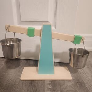 Lovevery scale and 2 pails